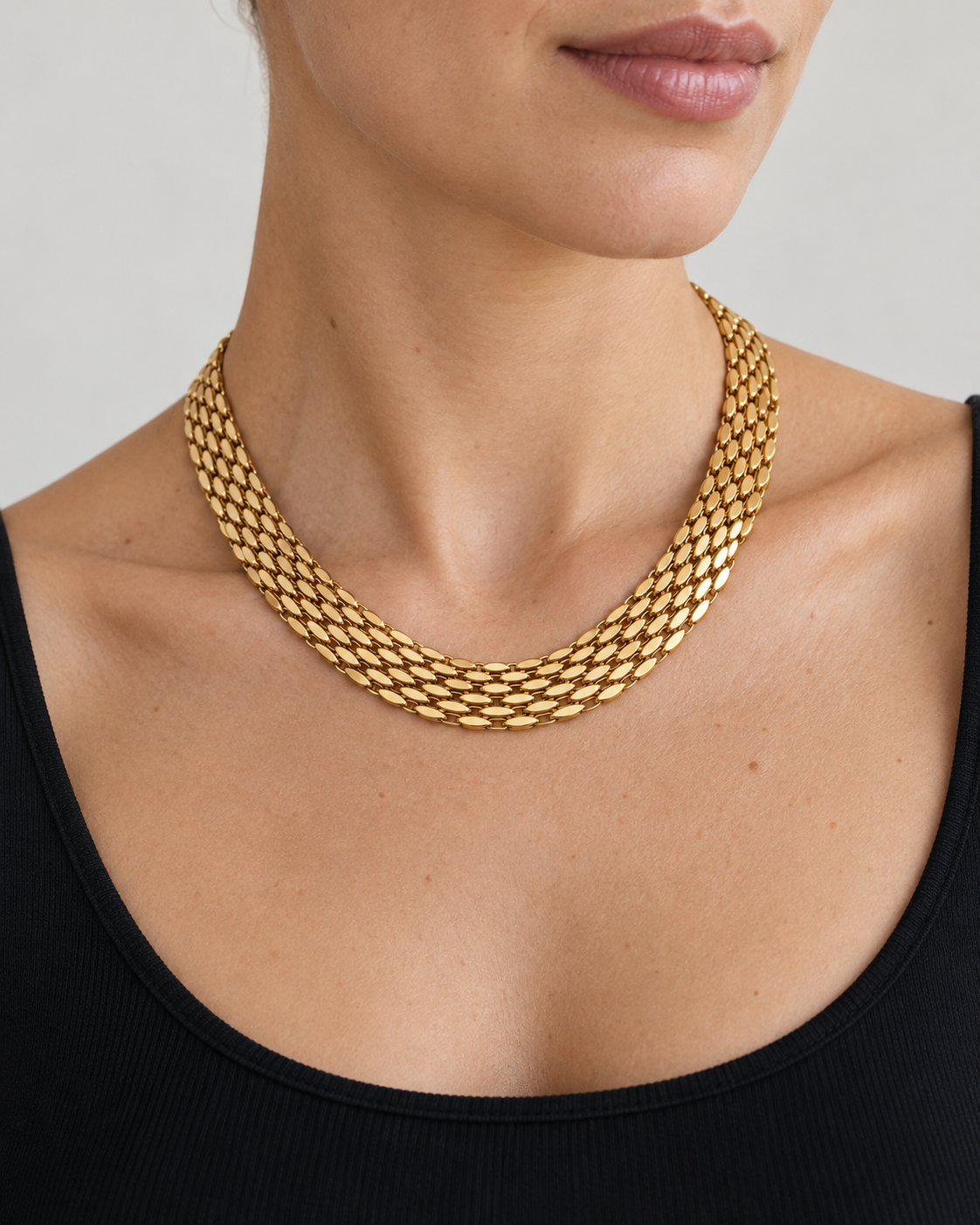Model wearing VEYRISSA Wide Flat Snake Chain Choker
