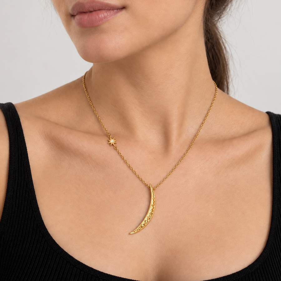 Model wearing VEYRISSA Crescent Star Drop Necklace