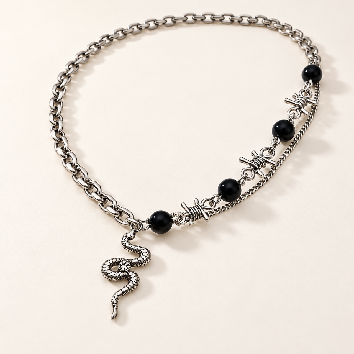 VEYRISSA Black Bead Thorn Chain Necklace — angled view